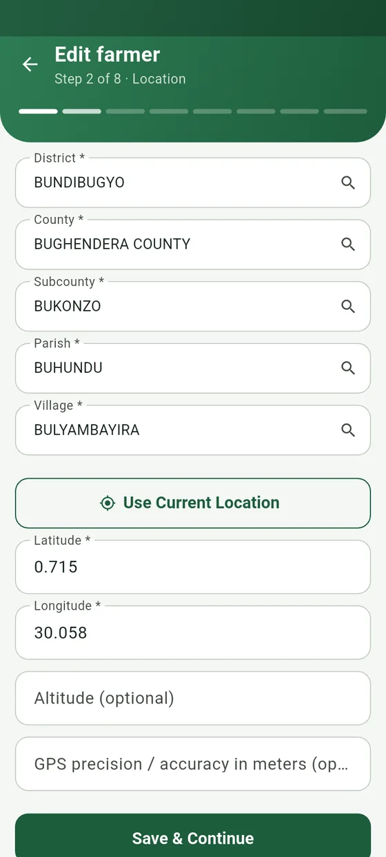 The farmer registration step for location, with searchable district, county, subcounty, parish and village lists and a GPS button